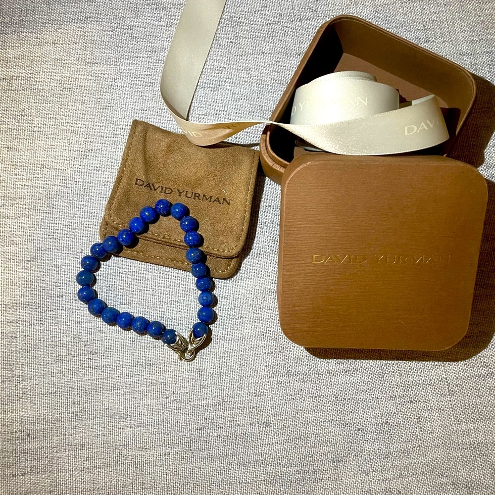 David Yurman
Sterling silver
Lapis lazuli
Bracelet, 8mm
Lobster clasp
Size 8.5